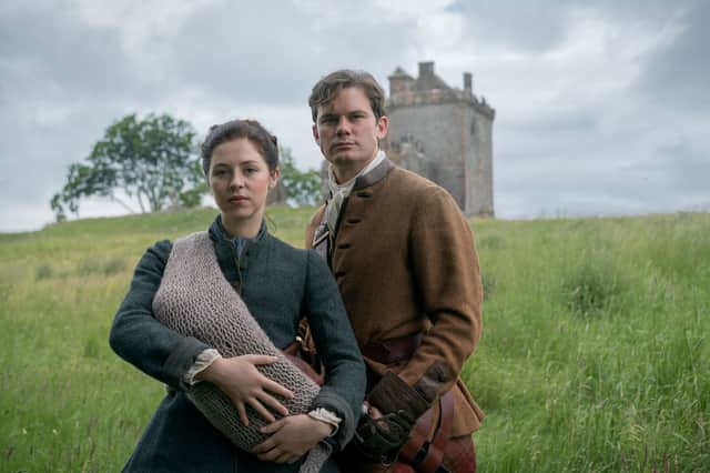 Julia Moriston (Hermione Corfield) and Henry Beauchamp (Jeremy Irvine) at Castle Leathers (Balvaird Castle) in Outlander: Blood of my Blood. Blood of My Blood © 2024 Starz, LLC