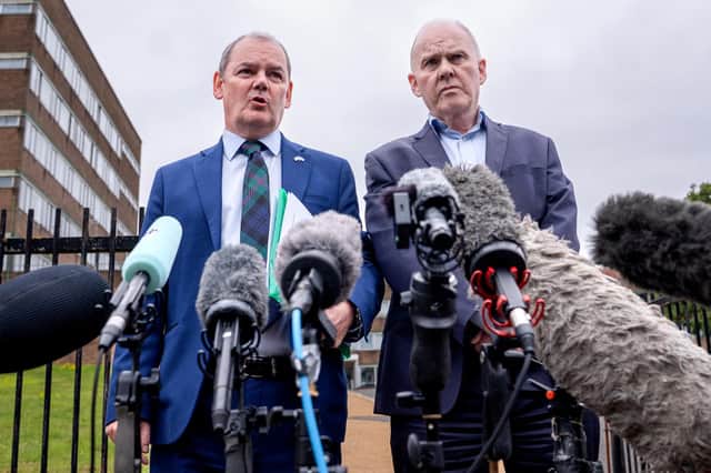 David Henry, left, and Sean Clerkin speak to the media outside Fettes Police Station, Edinburgh, where they made a report to the police about the finances of Yes Scotland, the group which campaigned for a Yes vote in the 2014 independence referendum