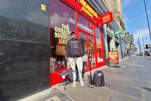 Ed Jaxon, 30 from Fife, had been queuing for the opening of SpudBros Express on Lothian Road since 11pm the night before.