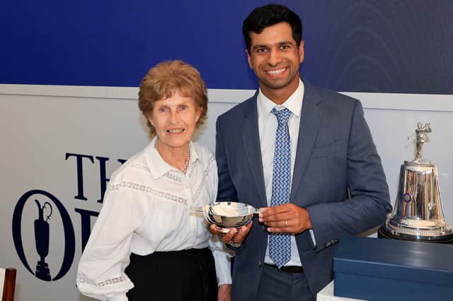 PGA champion Aaron Rai pictured with AGW president Lewine Mair after receiving an award at Royal Birkdale