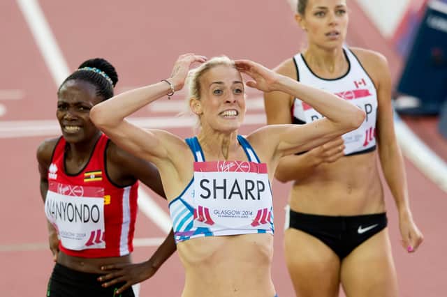 Lynsey Sharp is overcome with emotion after winning silver in the 800m at Hampden Park during the athletics programme at the 2014 Commonwealth Games.