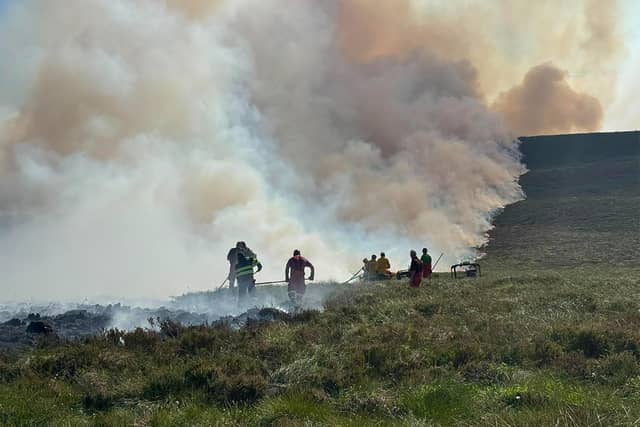 Firefighters near Ryvoan Bothy in Cairngorms National Park. Photo credit RSPB Scotland/PA Wire