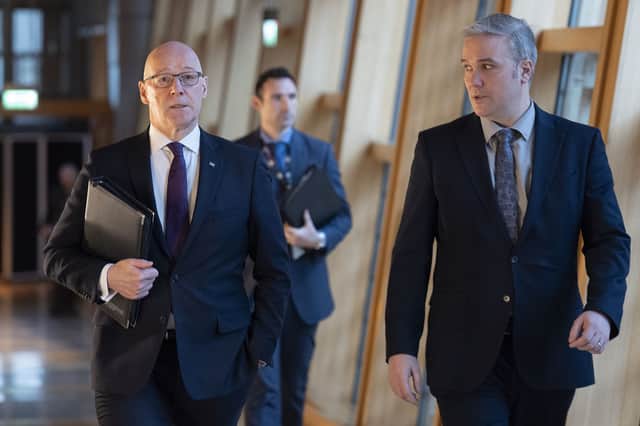 SNP fair work minister Tom Arthur (right) with First Minister John Swinney