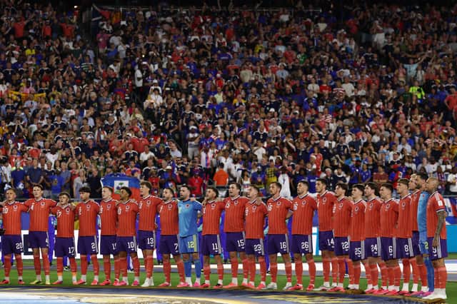 Scotland players sing their national anthem before the 2026 World Cup Group C match against Haiti at the Boston Stadium in Foxborough on June 13, 2026.