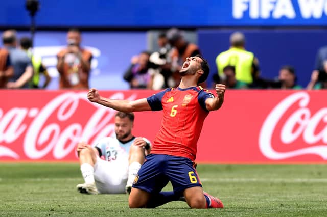 Spain's Mikel Merino celebrates after their semi-final victory over France. They now play Argentina in the final (Picture: Carl Recine)