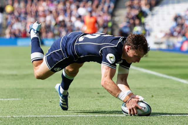 Scotland's Jamie Dobie scores his side's fifth try during the Nations Championship win over Fiji.