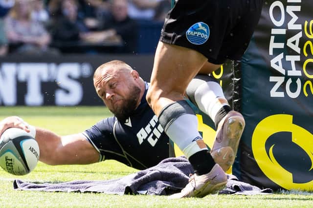Scotland's Pierre Schoeman scores his side's second try during the Nations Championship match against Fiji at Scottish Gas Murrayfield Stadium.