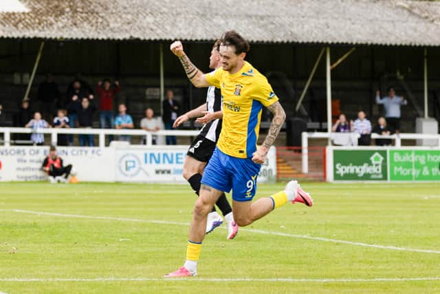 Kilmarnock's Joe Hugill celebrates his stoppage time winner against Elgin at Borough Briggs in the Premier Sports Cup. (Photo by Finlay Thom / SNS Group)