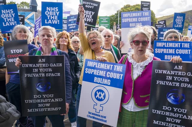 Campaigners from For Women Scotland outside the Scottish Parliament in Edinburgh