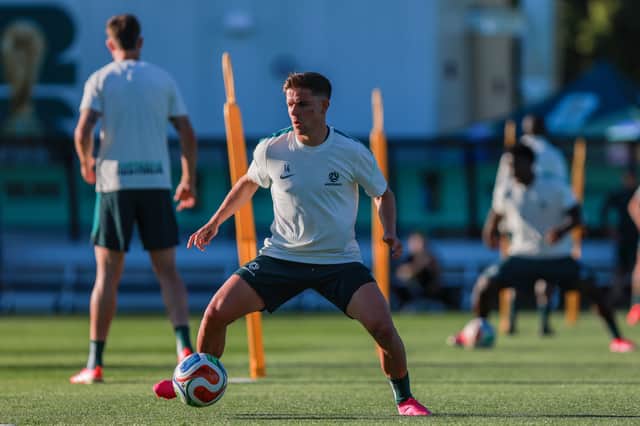 Australia midfielder Cammy Devlin has joined Rangers.