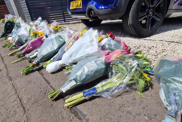 Lots of flowers have been left by members of the local community, who have been left shocked by Vikki's death at the age of just 44.
