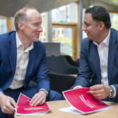 Michael Marra, left, with Anas Sarwar (Jane Barlow/PA)