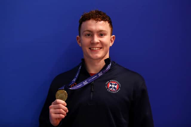 Archie Goodburn of Edinburgh University celebrates with the gold medal after winning the men's 50m breaststroke at the British Swimming Championships in 2023 at Ponds Forge.