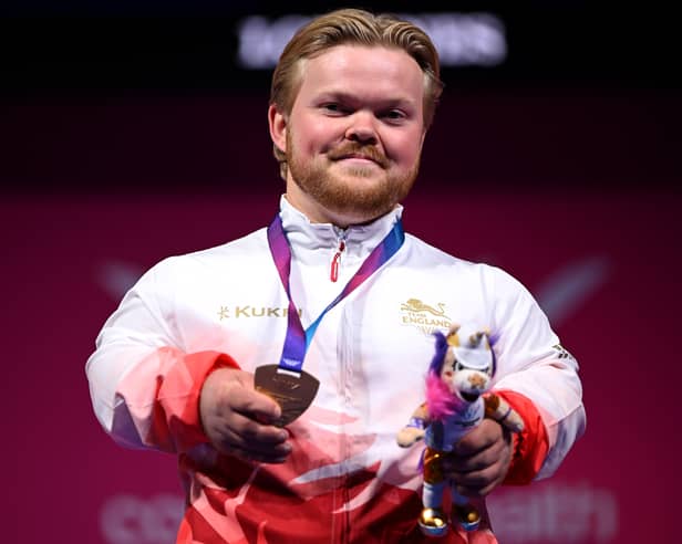 Gold medallist Mark Swan of England after his victory in the men's Para Powerlifting Lightweight event on day one of the Glasgow 2026 Commonwealth Games at SEC Armadillo.