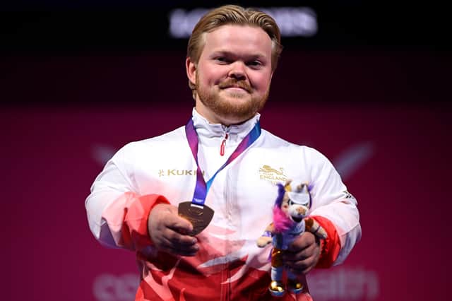 Gold medallist Mark Swan of England after his victory in the men's Para Powerlifting Lightweight event on day one of the Glasgow 2026 Commonwealth Games at SEC Armadillo.