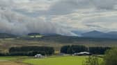 Smoke rising near Nethy Bridge on Saturday during the wildfire in the Cairngorms National Park, which has been declared a major incident. PIC: Sandy McCook