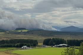 Smoke rising near Nethy Bridge on Saturday during the wildfire in the Cairngorms National Park, which has been declared a major incident. PIC: Sandy McCook
