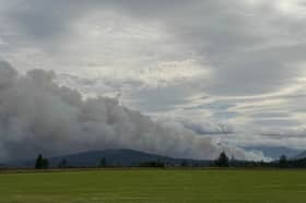 Smoke rises from the wildfire near Nethy Bridge on Friday hours before First Minister John Swinney made a formal request to the Ministry of Defence fo for aerial support to help tackle the blaze, which started on Wednesday, July 15.