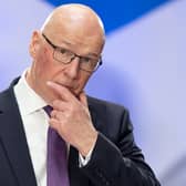 First Minister John Swinney (Jane Barlow/PA)