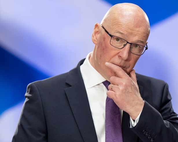 First Minister John Swinney (Jane Barlow/PA)
