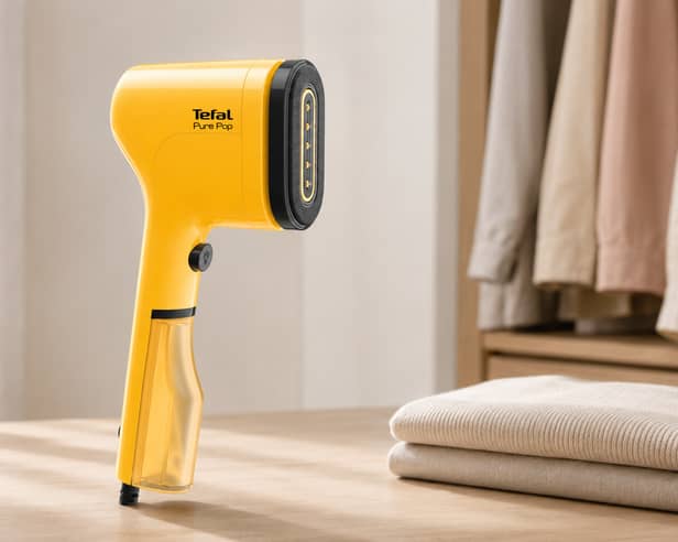 The yellow Tefal Pure Pop clothes steamer is reduced from £49.99 to £23.98 at Amazon