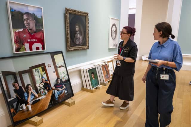 Tuesday 28th July 2026 Catherine Opie: To Be Seen which opens on the 8 August. . The Scotsman was invited  along and  curator, Imogen Gibbon, gives us a behind the scenes look at the work that goes into displaying their summer exhibitionnsOen America's most groundbreaking photographers, this will be Catherine Opie's first ever Scottish exhibition. Displayed across seven rooms in the Royal Scottish Academy building, Catherine Opie: To Be Seen is an opportunity to come face to face with Opie's mentors and collaborators, Queer communities, children, surfers, high school footballers and political crowds as well as self-portraits of the artist. Opie's work will also sit alongside a selection of 13 paintings from the historic Scottish national collection prompting new narratives around ideas of identity.