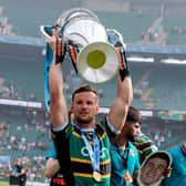 Rory Hutchinson of the Northampton Saints shows off the Gallagher Premiership trophy during the Gallagher PREM Final match between Northampton Saints and Exeter Chiefs at Allianz Stadium on June 20, 2026 (Pic: Getty)