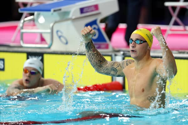 Flynn Southam of Team Australia celebrates after winning the gold medal during the Men's 100m Freestyle Final 