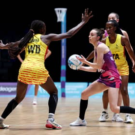 Iona Christian of Team Scotland competes for the ball with Shaffie Nalwanja of Team Uganda during the Preliminary Round Pool match at the Hydro