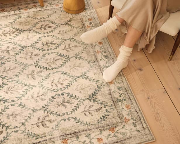 The English Garden rug has a soft recycled-polyester surface and a distressed botanical design. Photo supplied by Hug Rug
