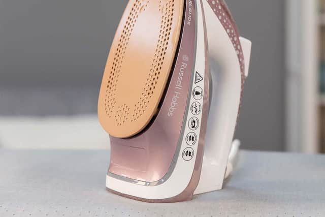 The Russell Hobbs Pearl Glide Rose iron's ceramic soleplate glides smoothly across different fabrics.