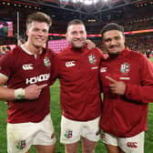 Huw Jones, Finn Russell and Sione Tuipulotu of the British & Irish Lions celebrate after their victory during the first test match of the series between Australia Wallabies and British & Irish Lions at Suncorp Stadium on July 19, 2025 (Pic: SNS)