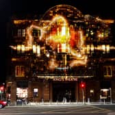 The light projection beamed onto the side of the King's Theatre in place of a planned drone show.
