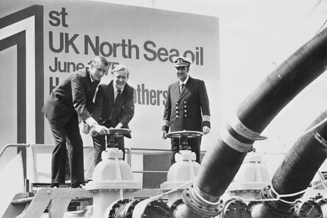In June 1975, the then Energy Secretary Tony Benn, centre, opened a discharge valve to release the first consignment of oil from the North Sea into a BP refinery in Kent (Picture: Keystone/Hulton Archive)