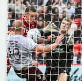 Aberdeen scrambled home an equaliser on 90 minutes before finding a stoppage-time winner via Kevin Nisbet's penalty,