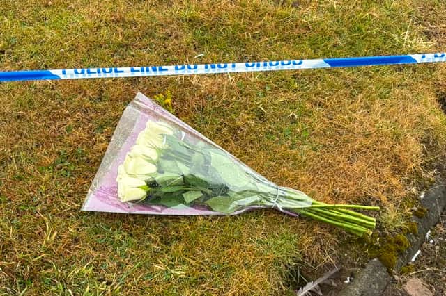 Floral tributes at the Elliot Industrial Estate  in Arbroath where a nine-year-old girl was found seriously injured and later died after being taken to Ninewells Hospital in Dundee. Picture: Rachel Keenan/PA