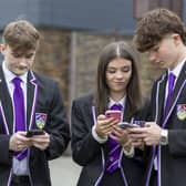 Pupils at Barrhead High, in East Renfrewshire, celebrate their outstanding exam results. 