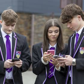 Pupils at Barrhead High, in East Renfrewshire, celebrate their outstanding exam results. 