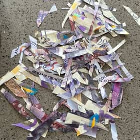 Shreds of bank notes found on Dean Road and near Glassel Park Road 