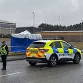 Police at the Elliot Industrial Estate in Arbroath where a nine-year-old girl was found seriously injured and later died after being taken to Ninewells Hospital in Dundee.