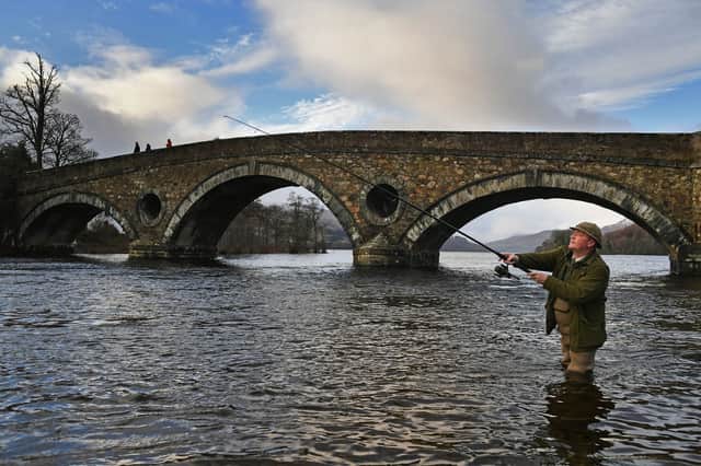 A fisherman casts on the River Tay at Kenmore (Picture: Jeff J Mitchell)