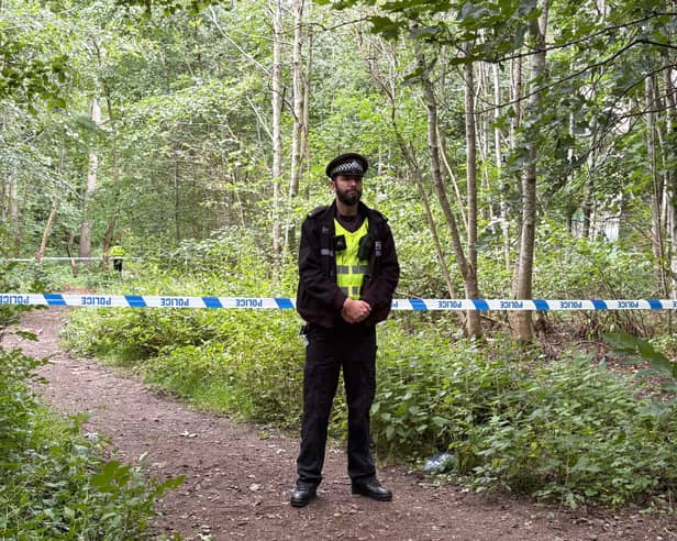 Police cordon at the scene in Gore Glen, Midlothian, where an 11-year-old girl died.