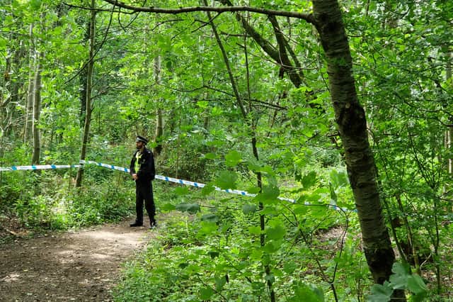 A police cordon remains in place on Saturday