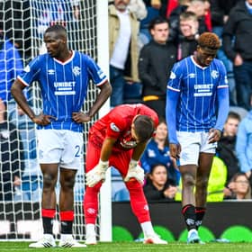 Olwethu Makhanya, Ivor Pandur and Emmanuel Fernandez look dejected after Rangers concede a late goal to lose 2-1 to Hibs at Ibrox. (Photo by Rob Casey / SNS Group)