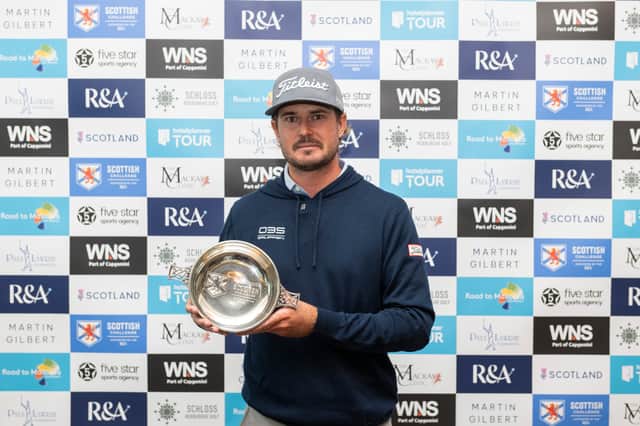 Swede Christofer Blomstrand shows off the trophy after winning the Scottish Challenge suported by The R&A at SCHLOSS Roxburghe near Kelso