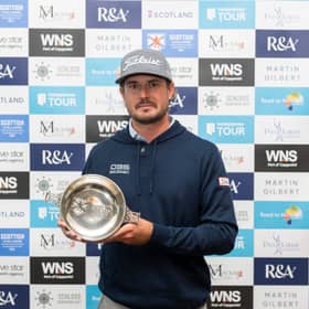 Swede Christofer Blomstrand shows off the trophy after winning the Scottish Challenge suported by The R&A at SCHLOSS Roxburghe near Kelso