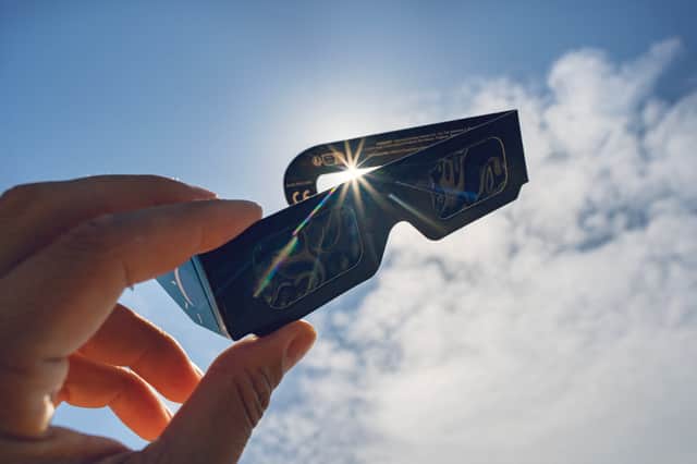 Eclipse-viewing glasses for direct observation of the sun.