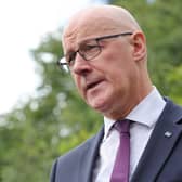 John Swinney flew business class to America for the World Cup