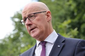 John Swinney flew business class to America for the World Cup