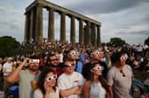 This lucky lot of sky watchers got eclipse glasses for the event